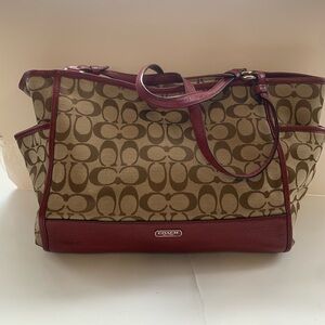 Coach Signature fabric with red leather trim